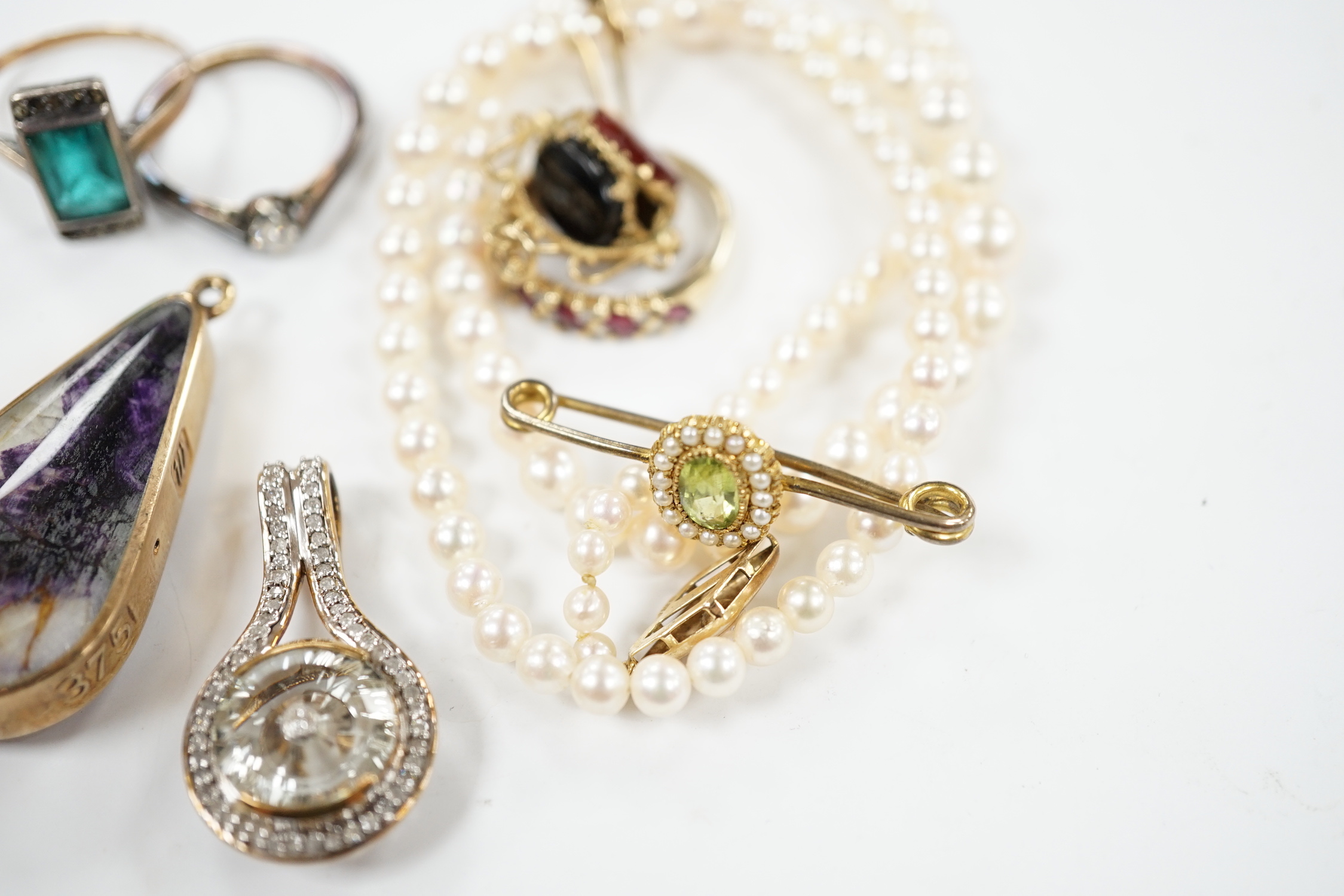 A small group of mainly modern 9ct jewellery including three gem rings, including solitaire diamond, five gem set pendants, including 9ct gold mounted banded agate and blue john, by David Scott Walker, a pair of lapis la